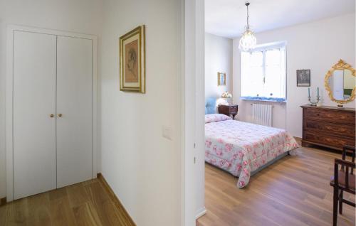 Postel nebo postele na pokoji v ubytování 2 Bedroom Awesome Apartment In Stia