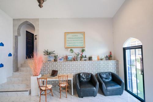 Ruang duduk di The Panwa Guesthouse, Phuket