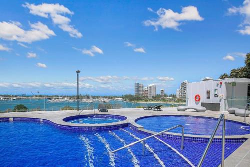 a large swimming pool on top of a building at Sundale at Southport - Resort-style Panorama in Gold Coast