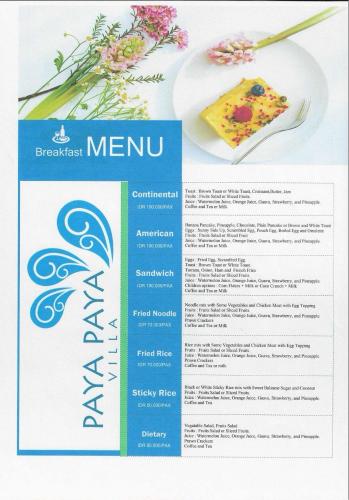 a blue and white menu with a plate of food at Seminyak Villa Paya paya Luxury near beach-Potato Head in Seminyak