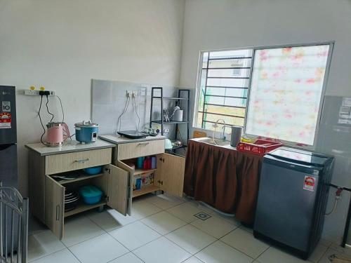 Billede fra billedgalleriet på Meoster Homestay Tuaran i Tuaran