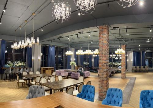 Restaurace v ubytování Возле EXPO, есть все настольные игры