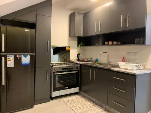 Dapur atau dapur kecil di Rosario Farm Home