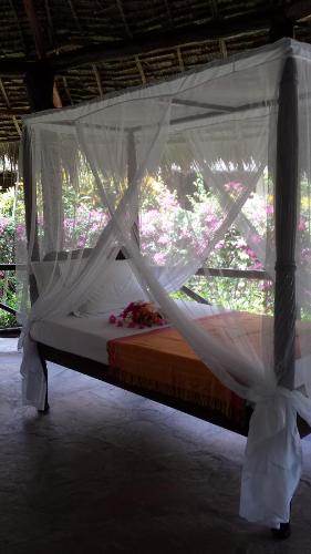 מיטה או מיטות בחדר ב-Villa Fortuna Malindi