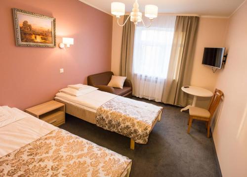 Ankur Hotellにあるベッド