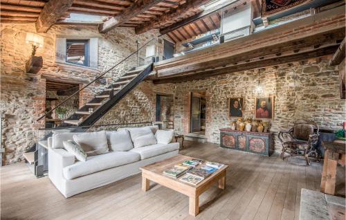 a living room with a couch and a table at Casa Politi in San Giustino Valdarno