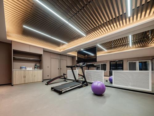 Fitness centrum a/nebo fitness zařízení v ubytování Echarm Hotel Xi'an Chanba International Exhibition Center