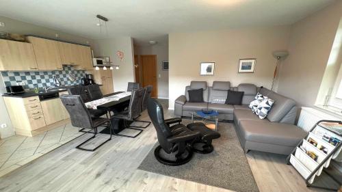 Posezení v ubytování Villa Elsa Wohnung 9, nur 150 m vom Strand entfernt