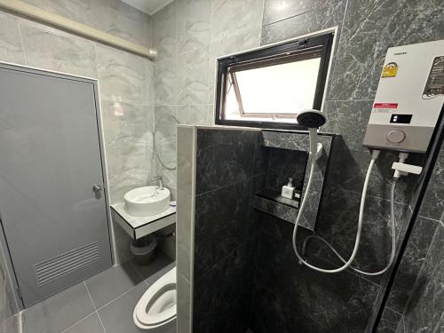 Koupelna v ubytování Karnhome บ้านกานต์รีสอร์ต