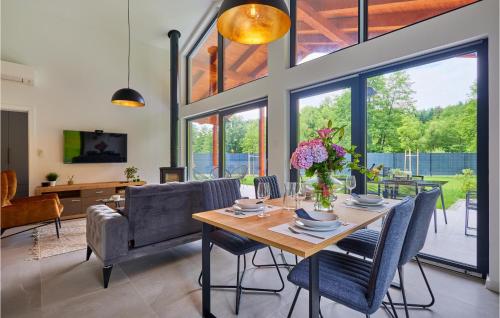 a dining room with a table and chairs at Wellness House By The Lake in Trakoščansko Jezero