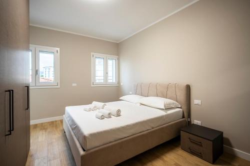 Postel nebo postele na pokoji v ubytování Residenza Novoli Prestige