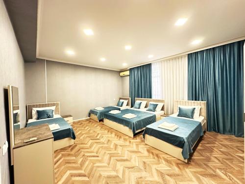 a hospital room with two beds at Nizami Luxury Apart in Baku