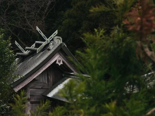 a cross on the top of a small house at RITA Izumo Sagiura in Izumo