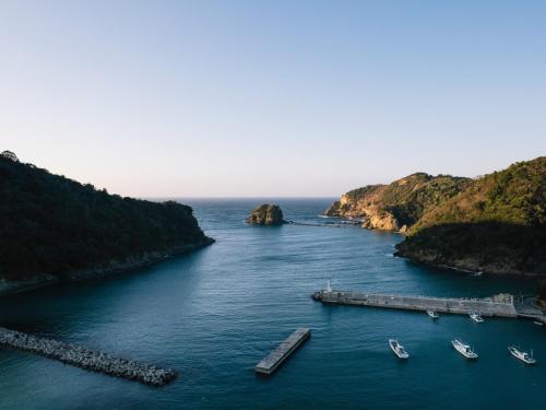 a group of boats in a large body of water at RITA Izumo Sagiura in Izumo