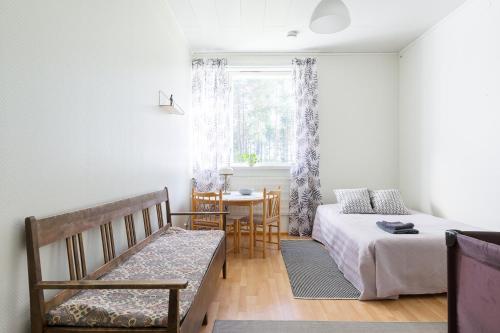 Vuode tai vuoteita majoituspaikassa Kangaskoti