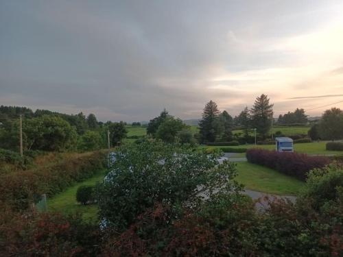 a view of a park with trees and a road at Glandore 2 bedroom house in Glandore