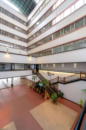 an image of the lobby of a building at Hyson heritage calicut in Kozhikode