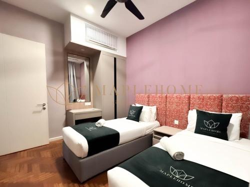 Un pat sau paturi într-o cameră la Vista Premier Suites Genting Highlands