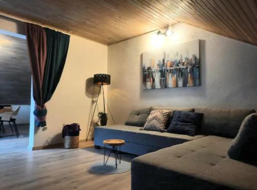a living room with a couch and a table at Apartment Katarina in Hvar