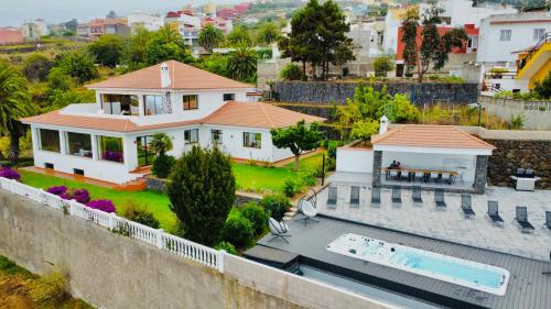 an aerial view of a house with a swimming pool at Villa SOHLARA in La Orotava