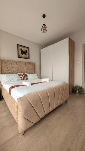 a bedroom with a large bed in a room at City Pen - By Tito Homes in Nairobi