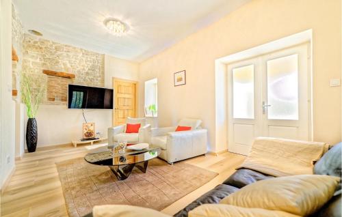 a living room with a couch and a table at Villa Demetra in Motovun