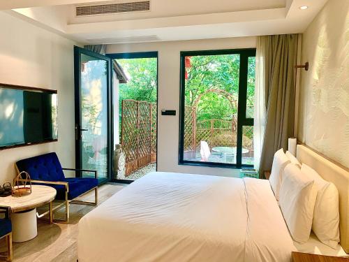 Katil atau katil-katil dalam bilik di Xishang Yunjian Holiday Hotel