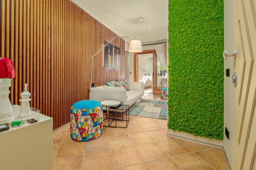 Ένα ή περισσότερα κρεβάτια σε δωμάτιο στο ILIA'S House Porto Rotondo