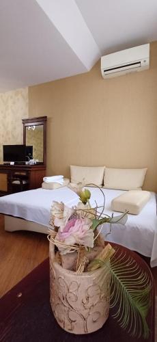 Acapulco Hotelにあるベッド