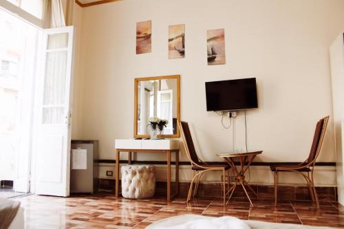 TV a/nebo společenská místnost v ubytování New Palace