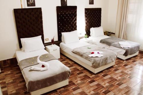 En eller flere senge i et værelse på New Palace