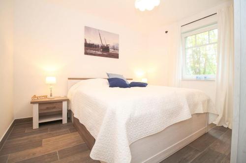 Postel nebo postele na pokoji v ubytování Meer-18