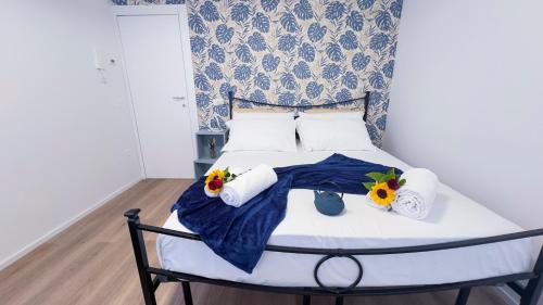 Una cama o camas en una habitación de Tre Esse by Ca-Sa Check
