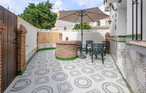 En terrasse eller udendørsområde på 2 Bedroom Lovely Home In Málaga