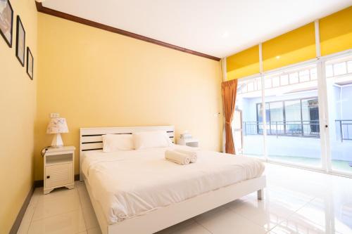 Katil atau katil-katil dalam bilik di The Panwa Guesthouse, Phuket
