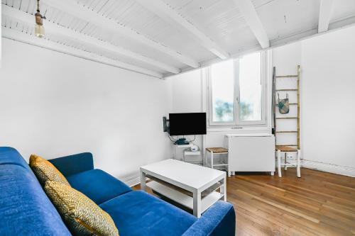 Photo de la galerie de l'établissement Appartement Cosy Paris Centre, à Paris