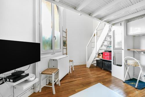 Photo de la galerie de l'établissement Appartement Cosy Paris Centre, à Paris