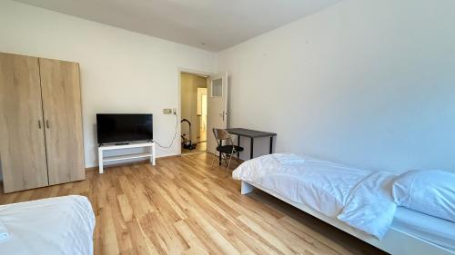 Postel nebo postele na pokoji v ubytování Apartment in Bad Bramstedt ruhige Lage im Haus zur Alleinnutzung mit Parkplatz & WLAN