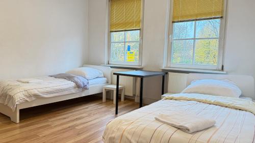 Postel nebo postele na pokoji v ubytování Apartment in Bad Bramstedt ruhige Lage im Haus zur Alleinnutzung mit Parkplatz & WLAN