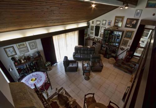 an overhead view of a living room with a couch at Rooms Branka in Križevci