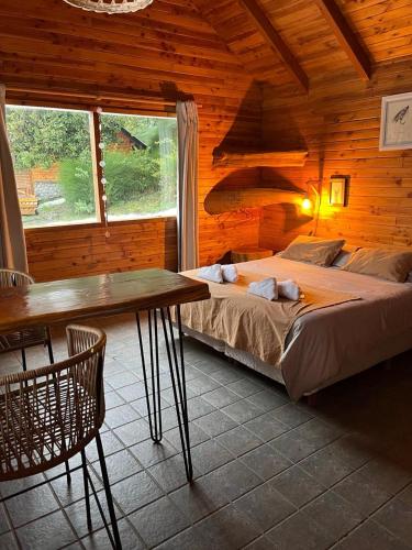 Letto o letti in una camera di Costa Traful