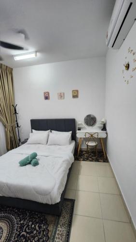 Postel nebo postele na pokoji v ubytování EnL Homestay ALANIS Residence