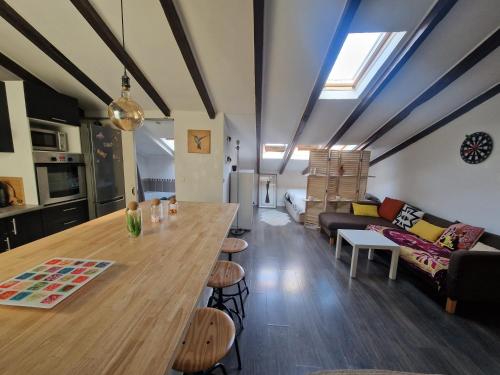 Atypique appart plein centre