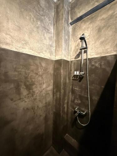 a shower in the corner of a bathroom at Central luxury apartment in Patra