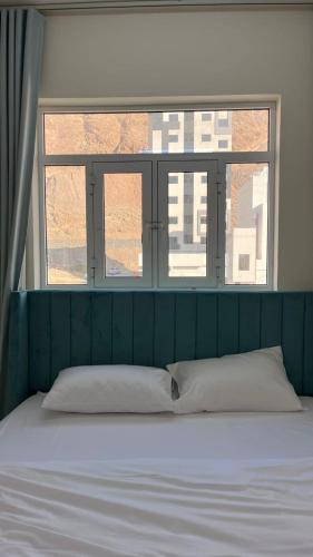Postel nebo postele na pokoji v ubytování Sunset hotel