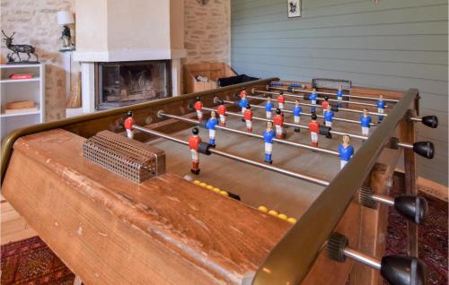 a group of toy men playing a game of bowling at 3 Bedroom Amazing Home In Carrouges in Carrouges