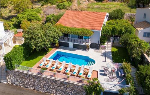 an aerial view of a house with a swimming pool at Villa Libertas in Mlini