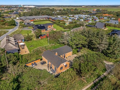 an overhead view of a house on a hill at Beautiful Holiday Home With Spa And Sauna, Close To The North Sea And The Center Of Søndervig in Ringkøbing