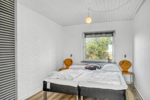 Large Holiday Home With A View Of The Fjordにあるベッド