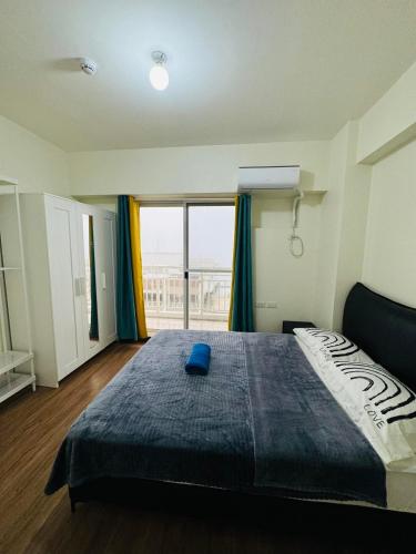 Krevet ili kreveti u jedinici u okviru objekta FAIRLANE residences